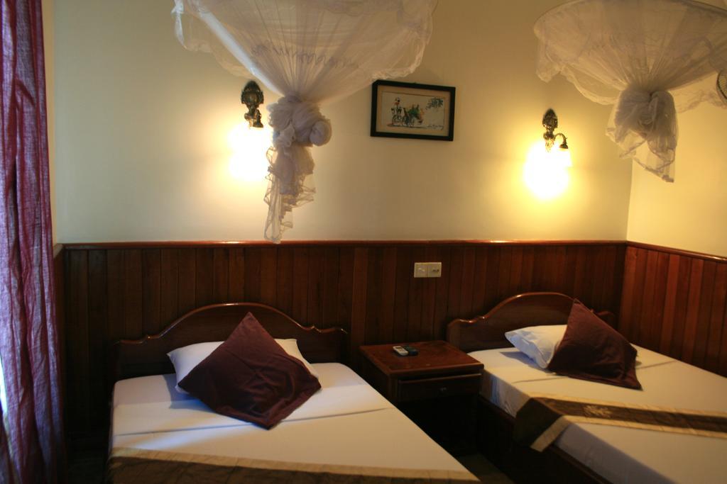 Firefly Guesthouse - The Berlin Angkor Siem Reap Rom bilde