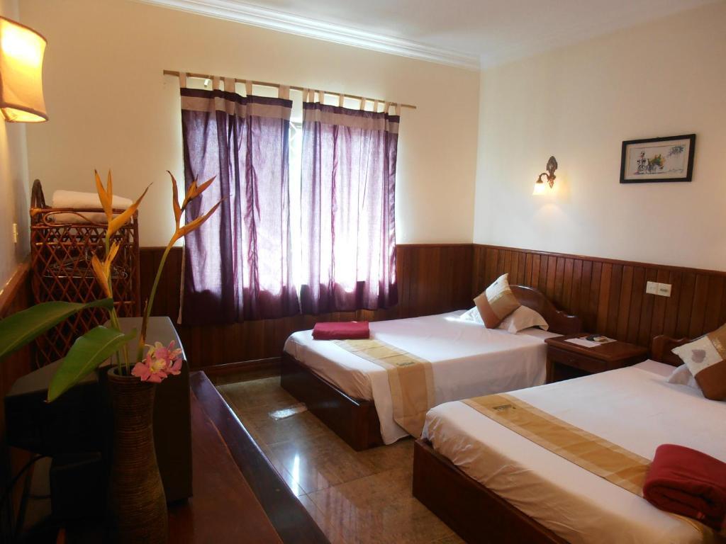 Firefly Guesthouse - The Berlin Angkor Siem Reap Rom bilde