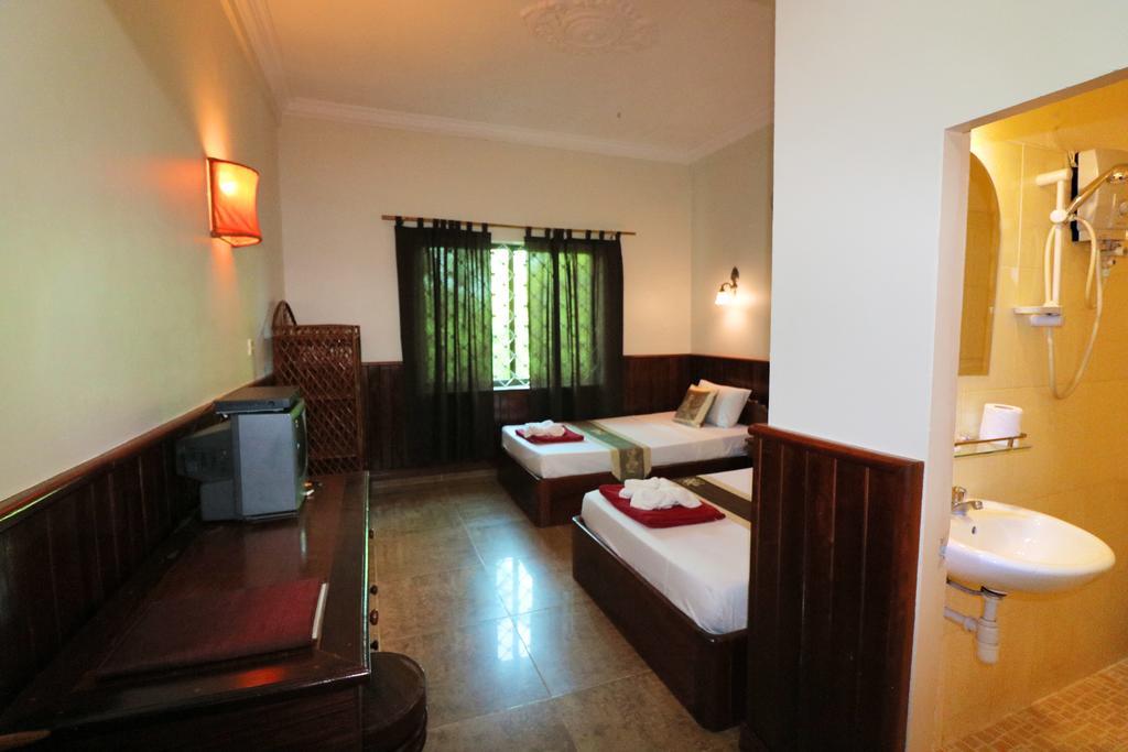 Firefly Guesthouse - The Berlin Angkor Siem Reap Rom bilde